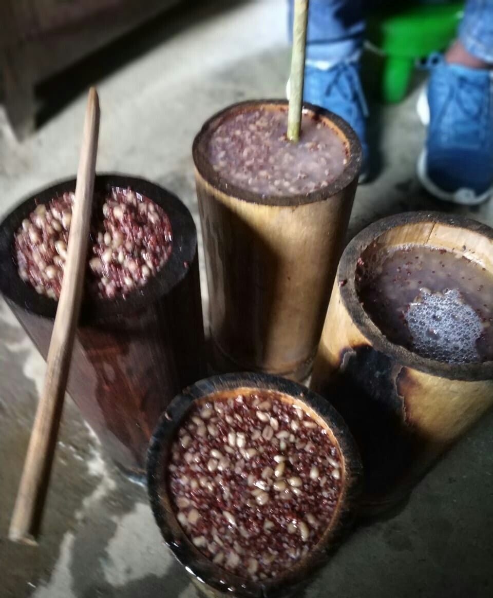 Kyat, traditional Khasi rice beer, in a bamboo tumbler