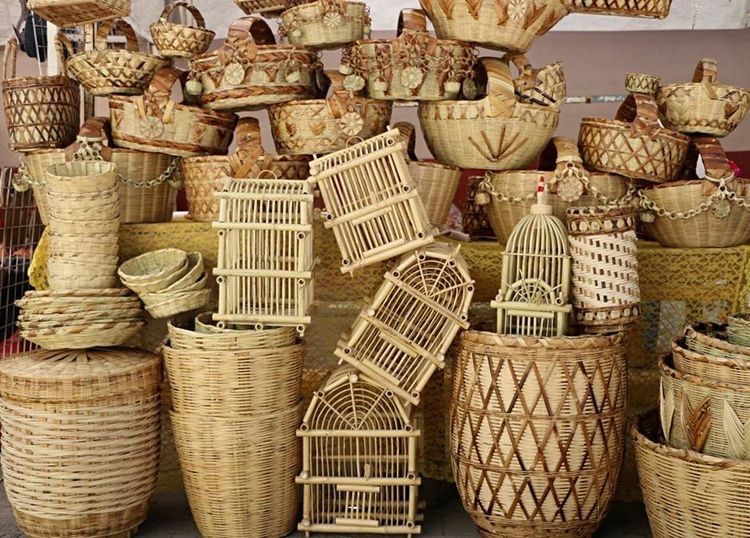 Various handicrafts made from bamboo and cane, including baskets and decor