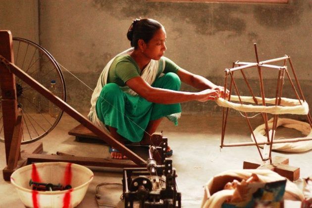 A local woman in Umden, Meghalaya, weaving traditional Eri silk